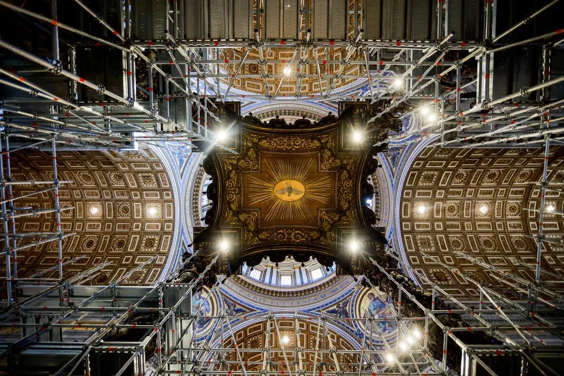 FILE PHOTO: A view of scaffolding around a baroque sculpted bronze canopy by Gian Lorenzo Bernini over the high altar of St. Peter's Basilica in preparation for its restoration, at the Vatican, February 21, 2024. REUTERS/Yara Nardi/ File Photo