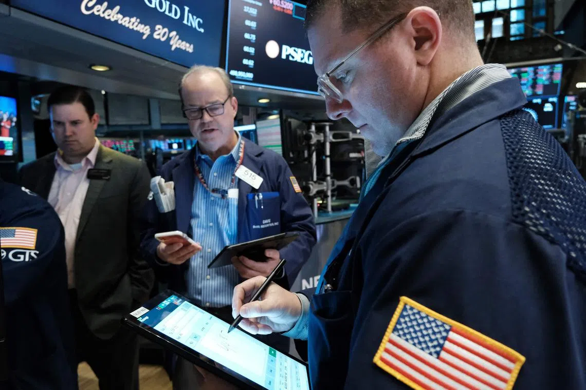 Traders work on the floor of the New York Stock Exchange, on Feb 8, 2023, in New York City. 