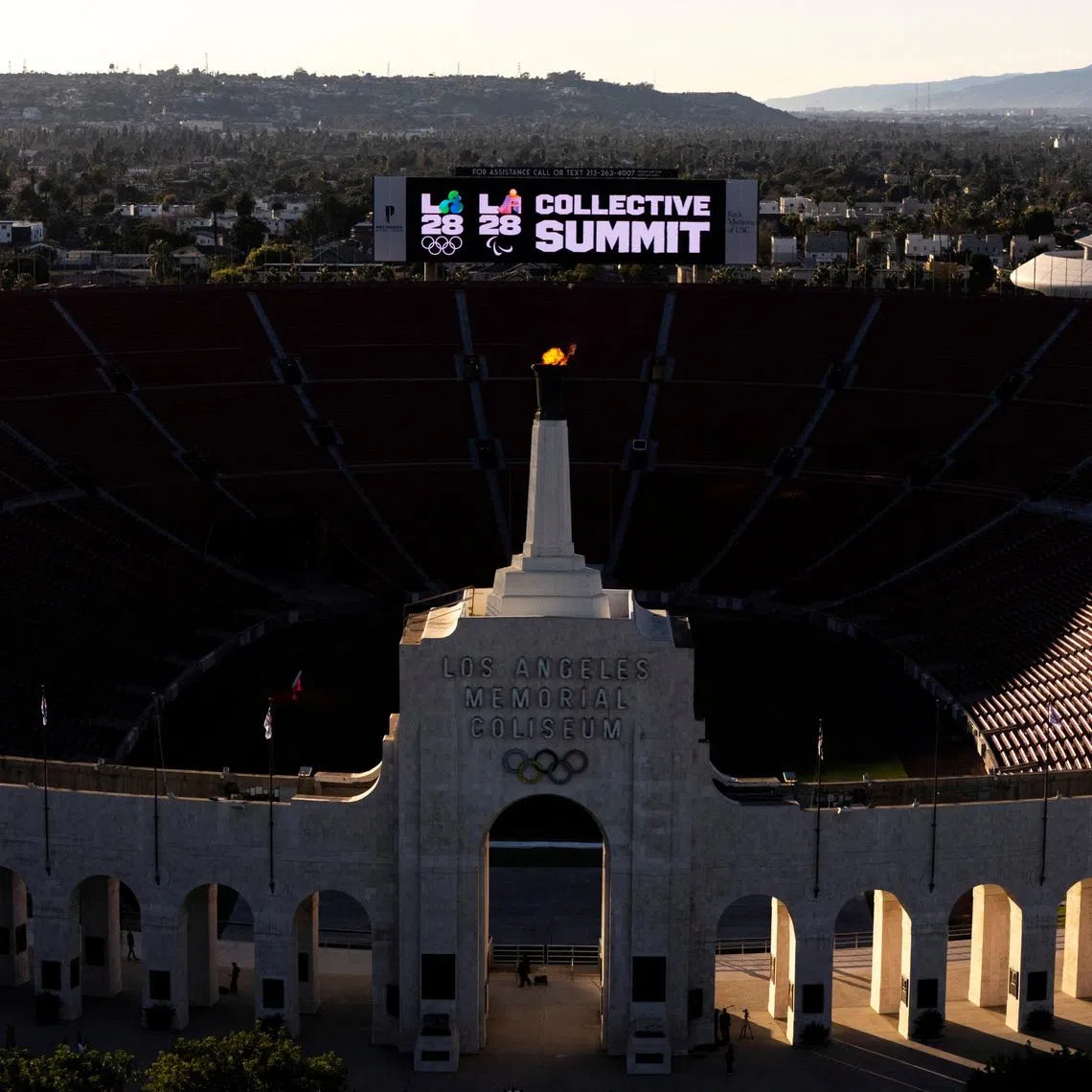 FILE PHOTO: Olympics - LA28 - Ceremonial lighting of the cauldron - LA Memorial Coliseum, Los Angeles, California, U.S. - January 13, 2026. Ceremonial lighting of the cauldron ahead of ticket registration launch. REUTERS/Daniel Cole/File Photo