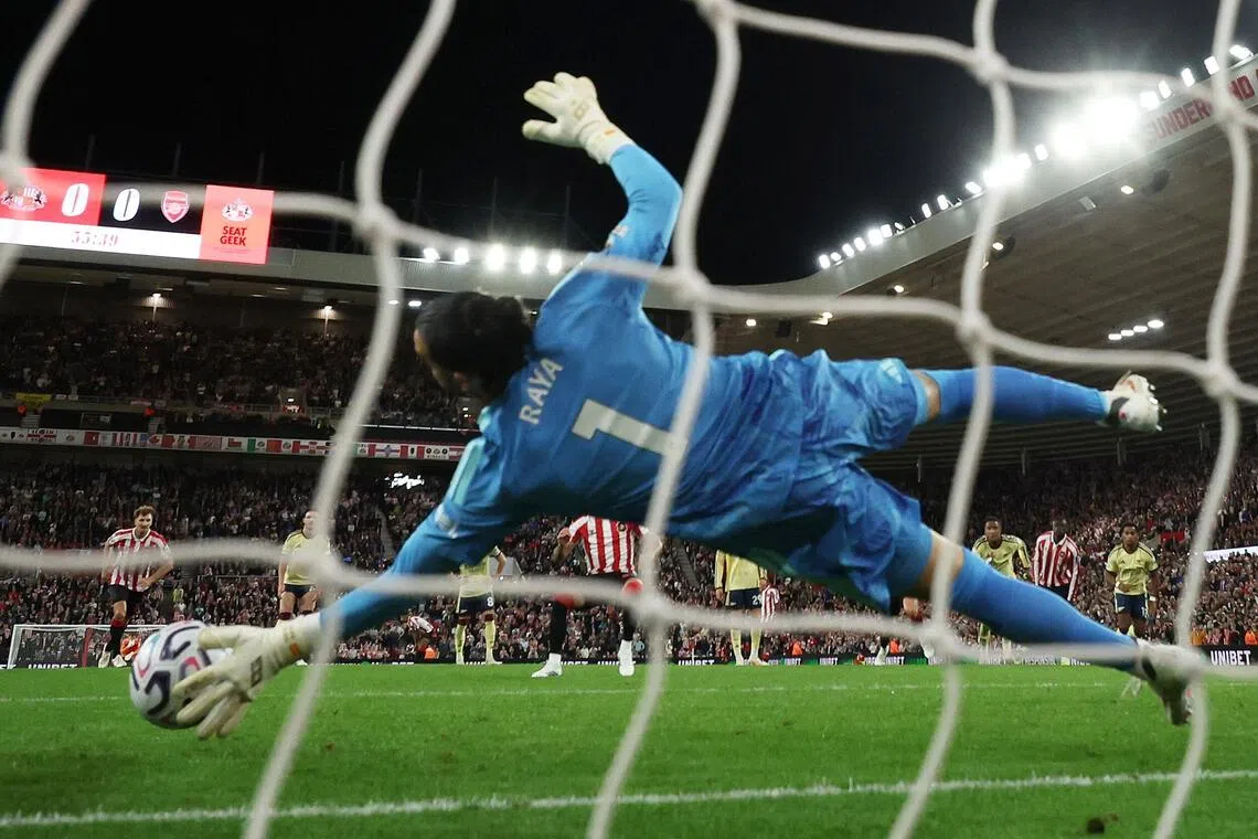 Arsenal’s David Raya saving a penalty by Sunderland’s Enzo le Fee in an EPL game on Sept 12. Arsenal won 2-0.