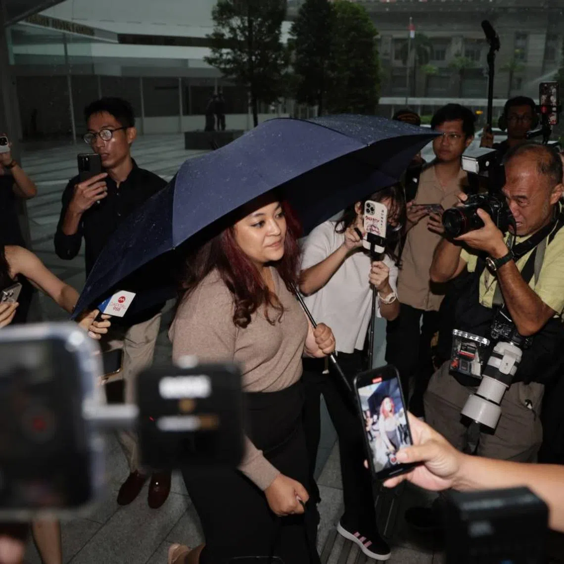 Ms Raeesah Khan arriving at the State Courts around 8.46am on Oct 14.