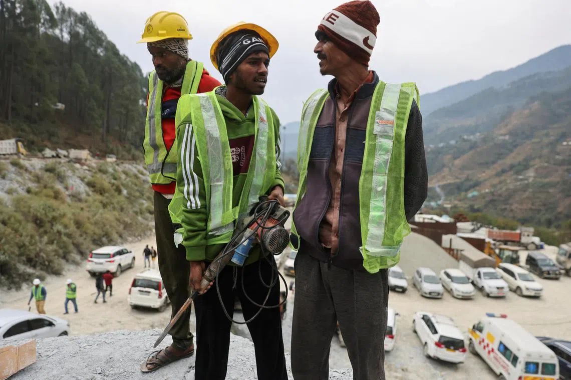 "Rat miners" waiting to begin manual drilling to free 41 construction workers from a collapsed tunnel in Uttarakhand.