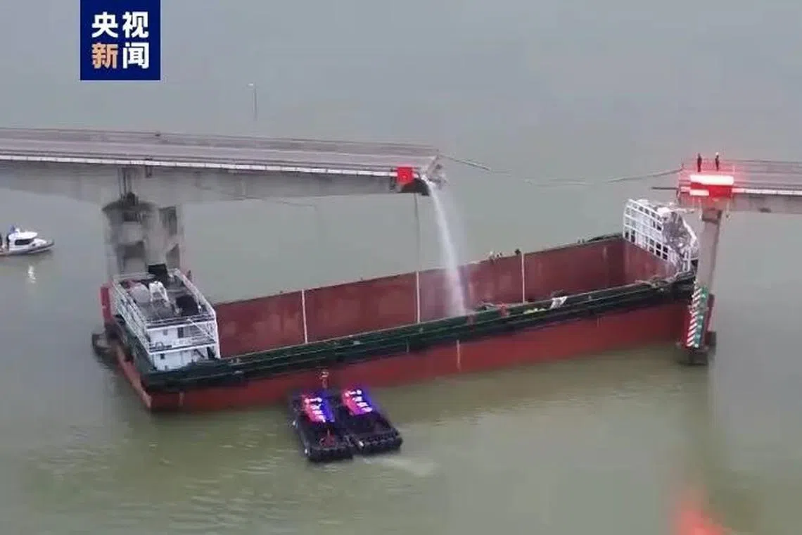 Images on CCTV showed an empty container barge lodged between two columns of the Lixinsha Bridge with part of the bridge’s two-lane road deck missing.