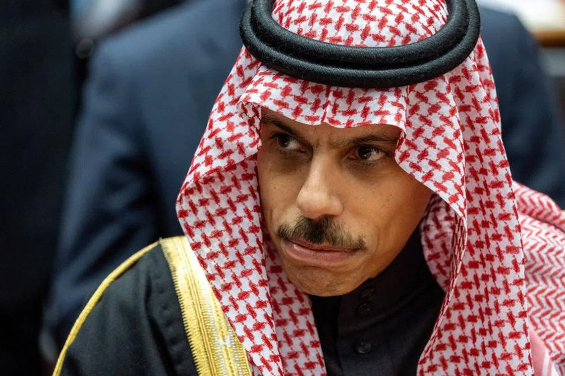 FILE PHOTO: Saudi Arabia's Foreign Minister Prince Faisal bin Farhan Al Saud arrives at a side event during an event commemorating the 75th Anniversary of the Universal Declaration of Human Rights, amid the ongoing conflict between Israel and the Palestinian Islamist group Hamas, at the United Nations in Geneva, Switzerland, December 12, 2023. REUTERS/Denis Balibouse/File Photo