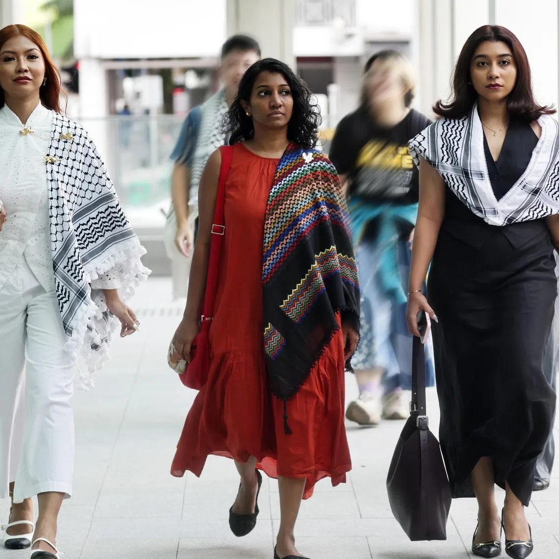 ID confirmed by Photog Kelvin Chng and nadine ST//


(IN White)Siti Amirah Binte Mohamed Asrori ; (In Orange)ANNAMALAI KOKILA PARVATHI and (in Black)MOSSAMMAD SOBIKUN NAHAR arriving
at State Courts on Jul 1, 2025

ncpalestine01

1. Siti Amirah, Annamalai Kokila and Mossammad Sobikun:

 They are three women behind an illegal procession in support of Palestine. 
First day of trial at 930am in 29D. (Nadine)

An earlier report: https://www.straitstimes.com/singapore/courts-crime/second-woman-accused-of-organising-procession-outside-istana-granted-permission-to-go-overseas