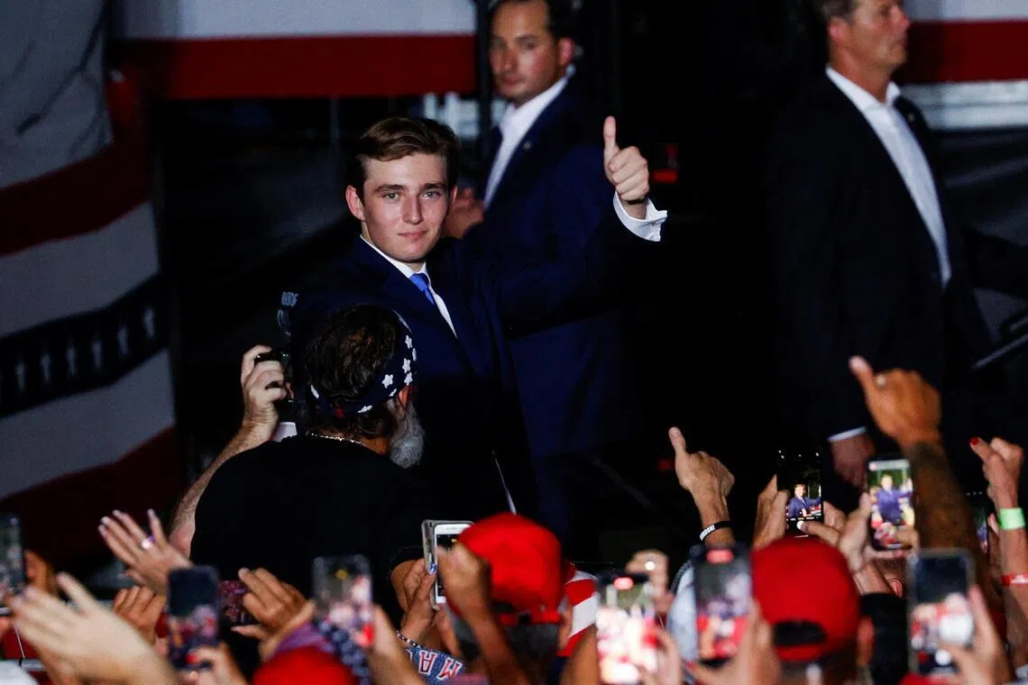 Barron William Trump, son of Republican presidential candidate and former U.S. President Donald Trump,gives a thumbs up at a campaign rally at Trump's golf resort in Doral, Florida, U.S., July 9, 2024.  REUTERS/Marco Bello 

