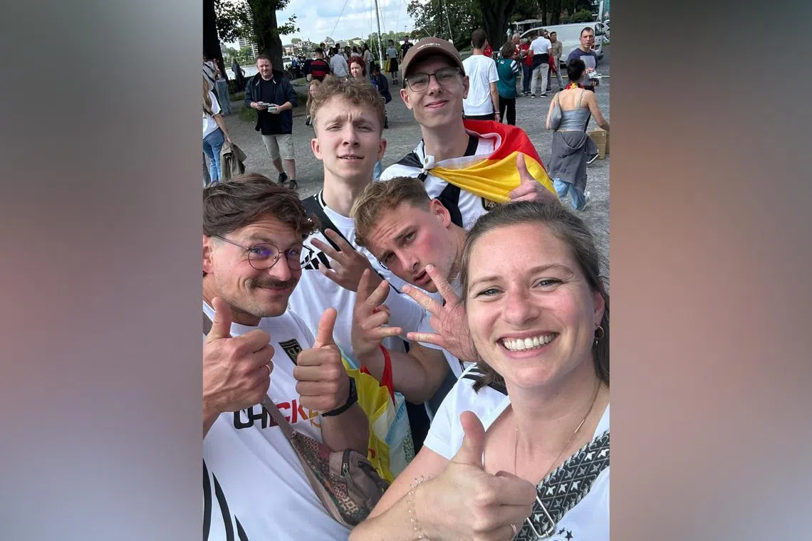 The Germany fans who handed in a Scotland fan's lost phone to the police.