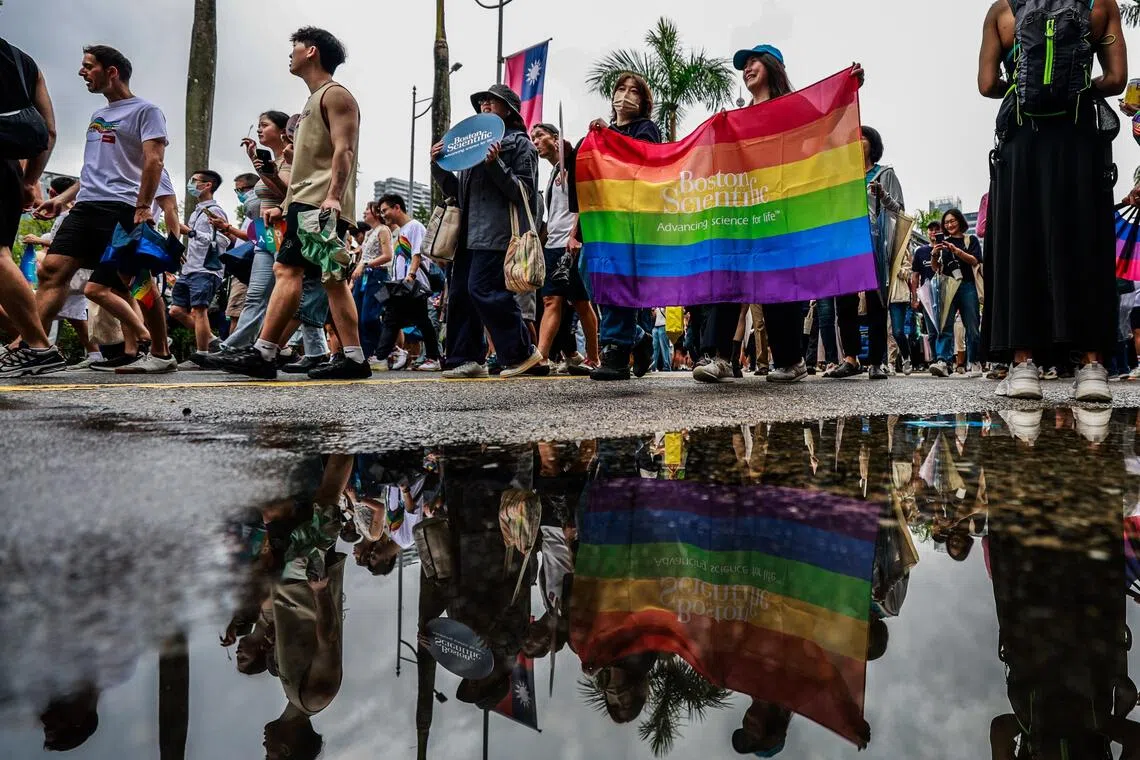 People participate in the annual Taiwan Pride parade in Taipei, Taiwan on Oct 25, 2025.