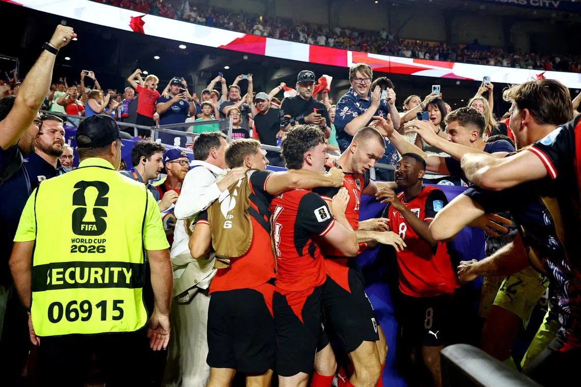 Soccer Football - FIFA World Cup 2026 - Group J - Algeria v Austria - Kansas City Stadium, Kansas City, Missouri, U.S. - June 27, 2026 Austria's Sasa Kalajdzic celebrates scoring their third goal with teammates REUTERS/Phil Noble