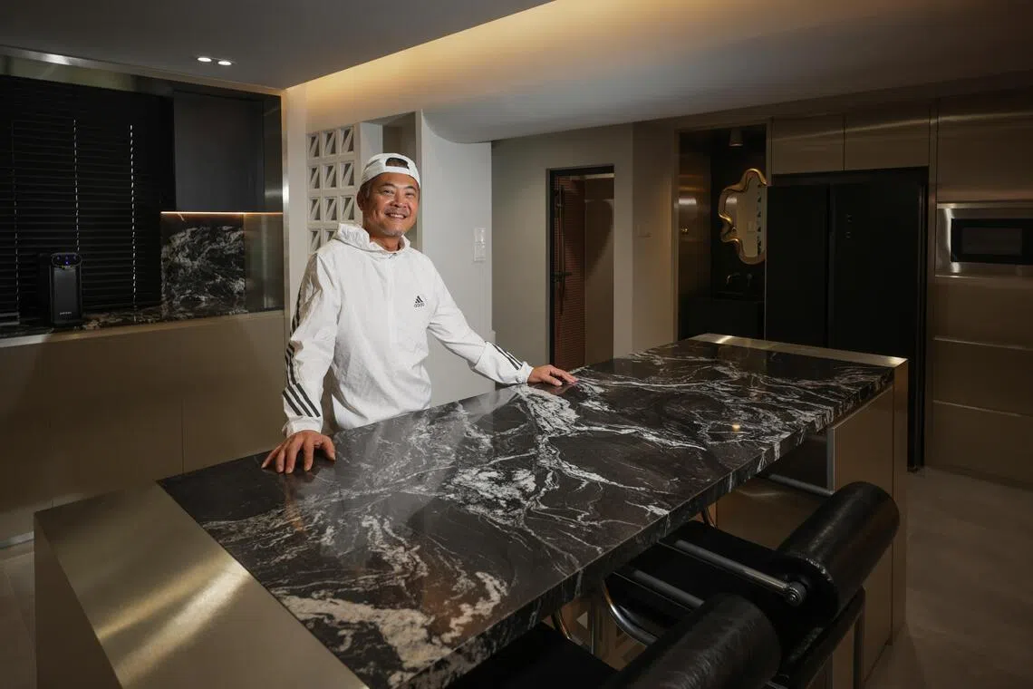 straitstimes.com - Benson Ang - Actor Terence Cao loves his 'black beauty', the granite island centrepiece of his renovated flat