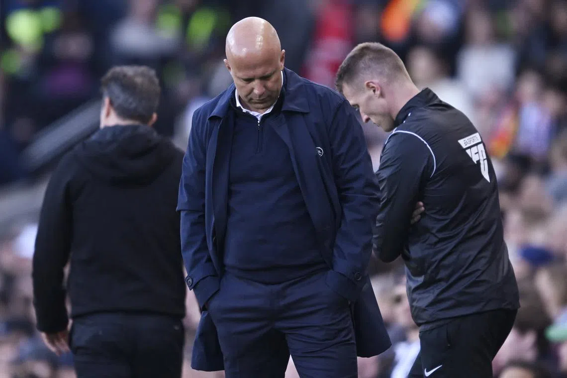 Soccer Football - Premier League - Fulham v Liverpool - Craven Cottage, London, Britain - April 6, 2025 Liverpool manager Arne Slot reacts REUTERS/Tony O Brien