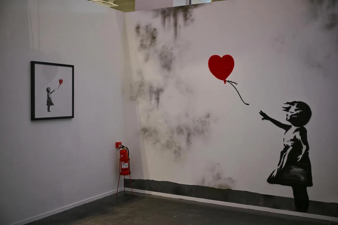 Behind the scene look at the upcoming The Art of Banksy: Without Limits exhibition which will launch on Dec 5, 2024, at Level 1, 25 Scotts Road.

Pictures taken on Dec 3, 2024.
