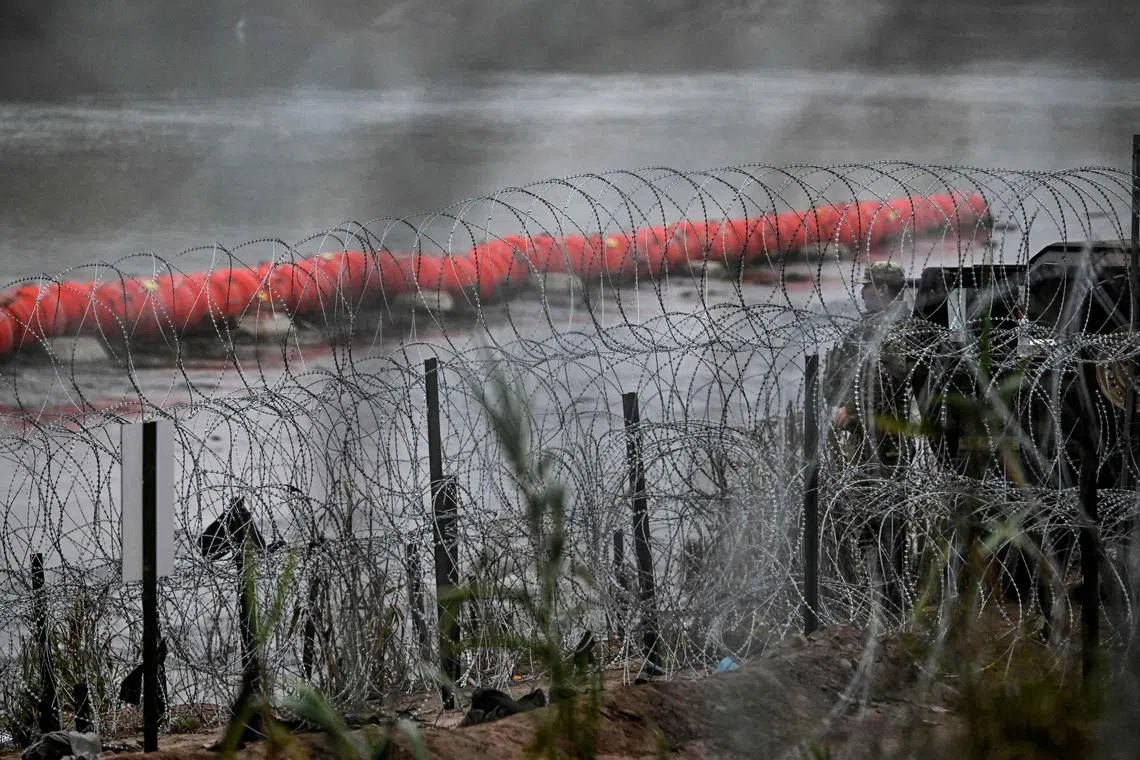 US border authorities struggled in December to process migrants as apprehensions reached nearly 11,000 in a single day.