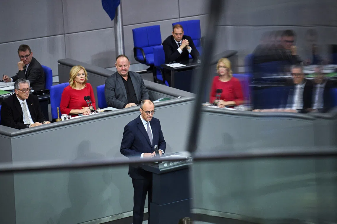 German Chancellor Friedrich Merz delivers a government declaration on the upcoming European Council meeting with focus on EU's support for Ukraine, developments in Middle East, European defense and security, EU competitiveness, and migration during a plenum session of the lower house of parliament, the Bundestag, in Berlin, Germany October 16, 2025. REUTERS/Annegret Hilse