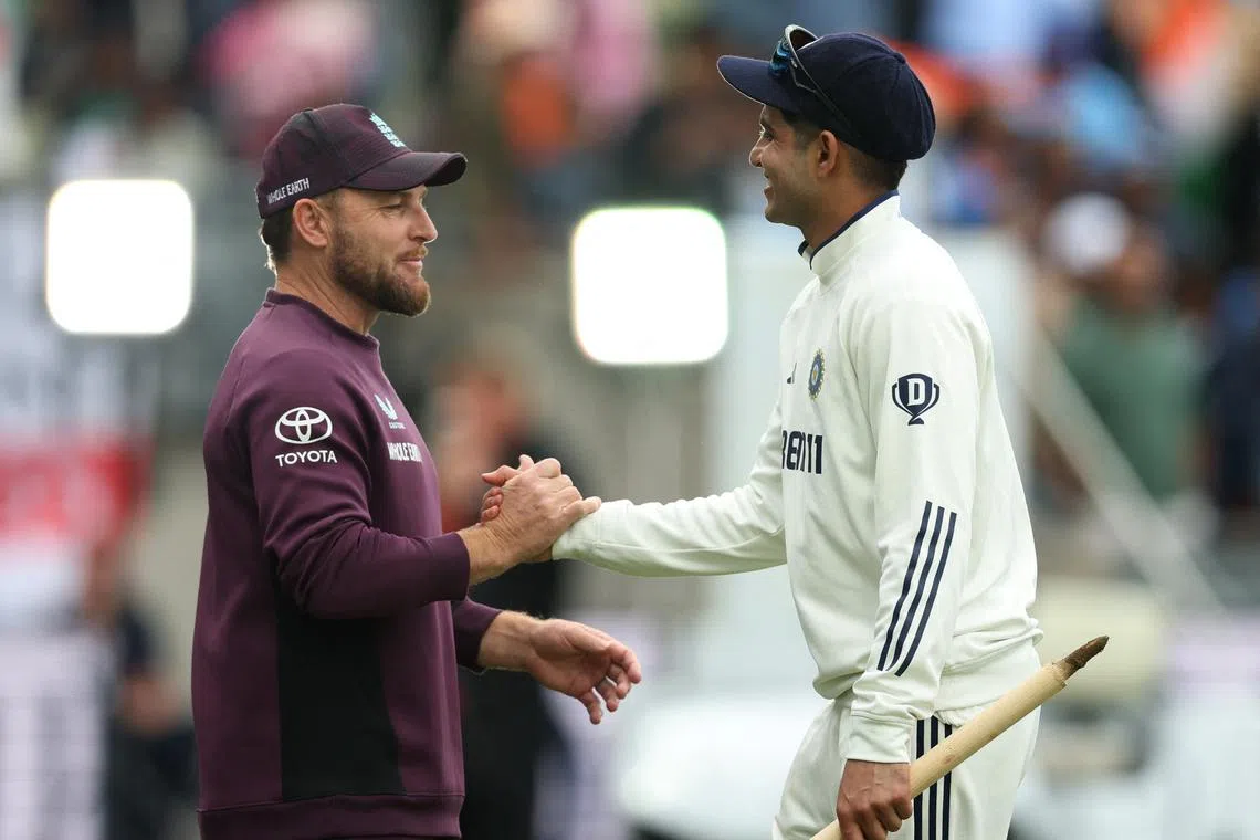Cricket - Second Test - England v India - Edgbaston Cricket Ground, Birmingham, Britain - July 6, 2025 England head coach Brendon McCullum shakes hands with India's Shubman Gill after the match Action Images via Reuters/Paul Childs