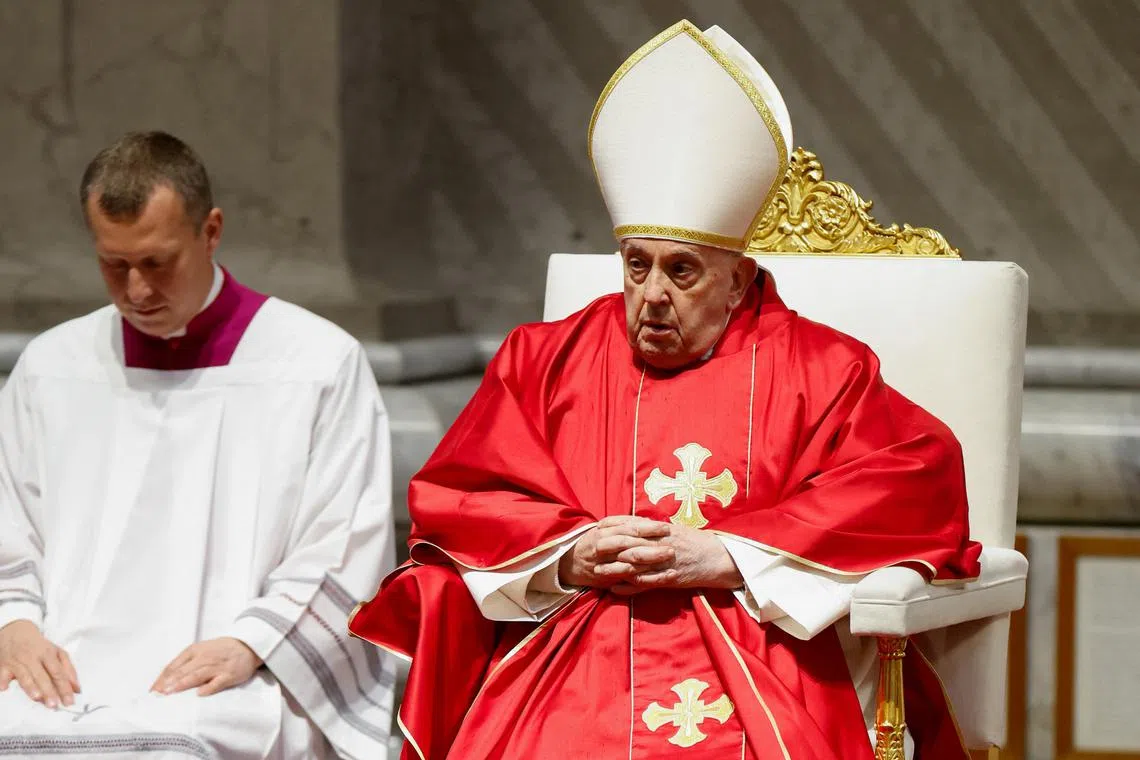 Pope Francis presides over the Good Friday Passion of the Lord service in Saint Peter's Basilica at the Vatican, March 29, 2024. REUTERS/Remo Casilli