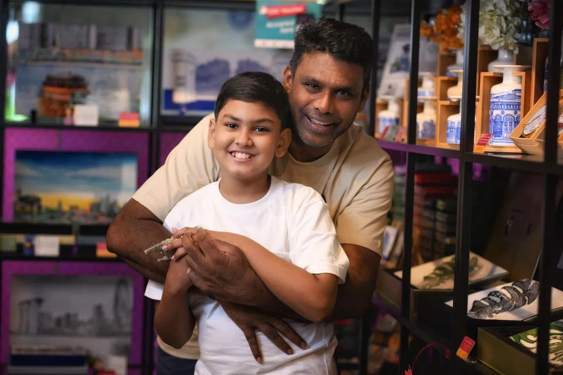 Mr Nakkeeran Balakrishnan says his autistic son Eaashan taught him the true meaning of unconditional love. ST PHOTO: CHONG JUN LIANG