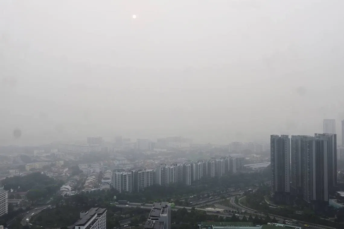 Hazy conditions seen from Clementi towards Pandan Reservoir at about 5.35pm on Oct 15.