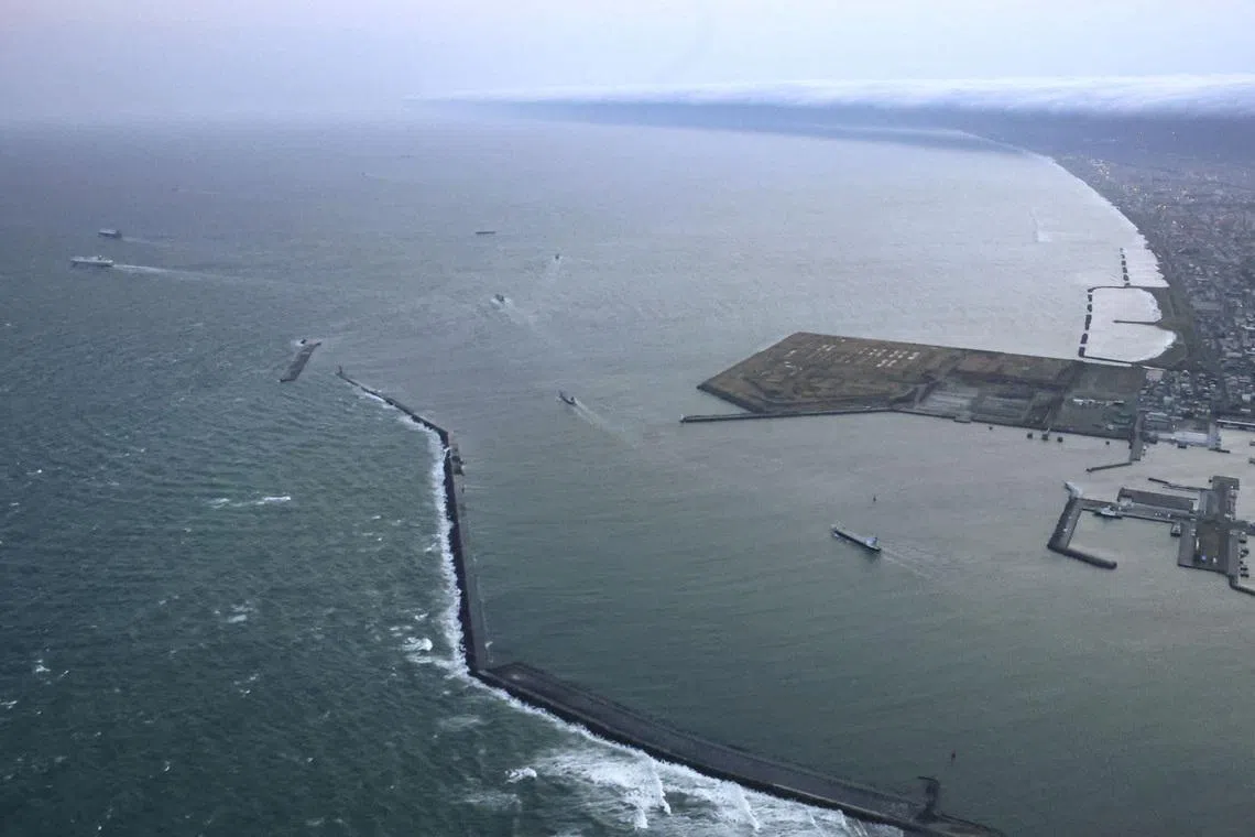 Vessels departing a port in Tomakomai, Hokkaido Prefecture, Japan, where a tsunami warning was issued following an earthquake, April 20, 2026.