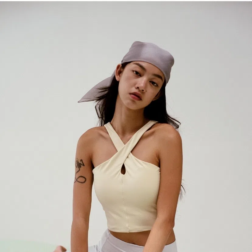 Rise Rise Cross Front Bra (left) and activewear.