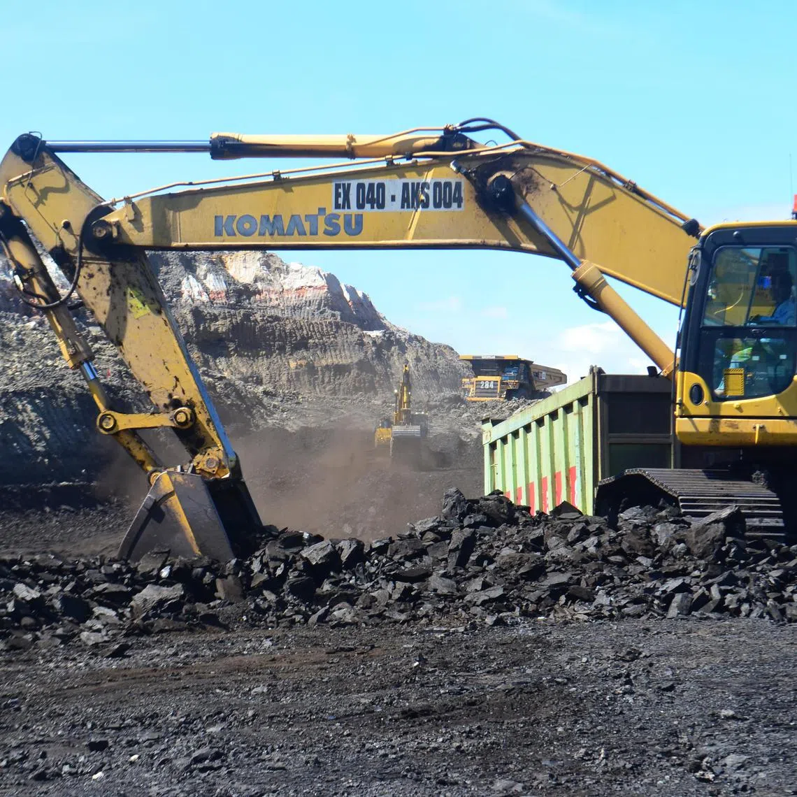 Excavators at work in Golden Energy and Resources' BIB mine in South Kalimantan.