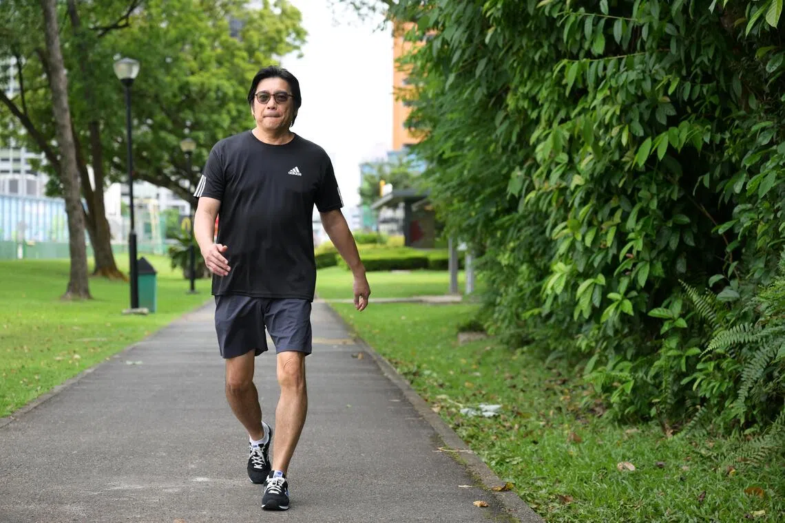 Mr New Boon Hwee, 57, lost weight through a year-long programme under NHG Polyclinics and achieved diabetes remission.