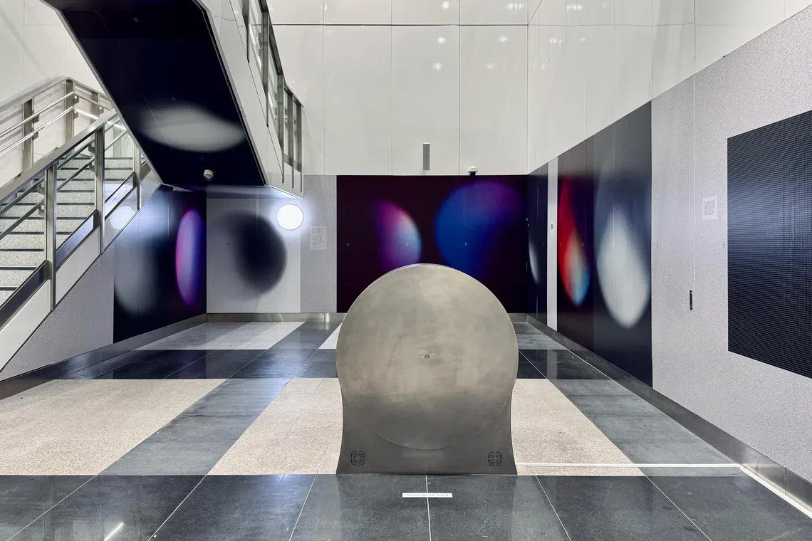 Path. 15, Cosmic Strangers by Indonesia-born Singaporean artist Boedi Widjaja is on show at Orchard MRT station.