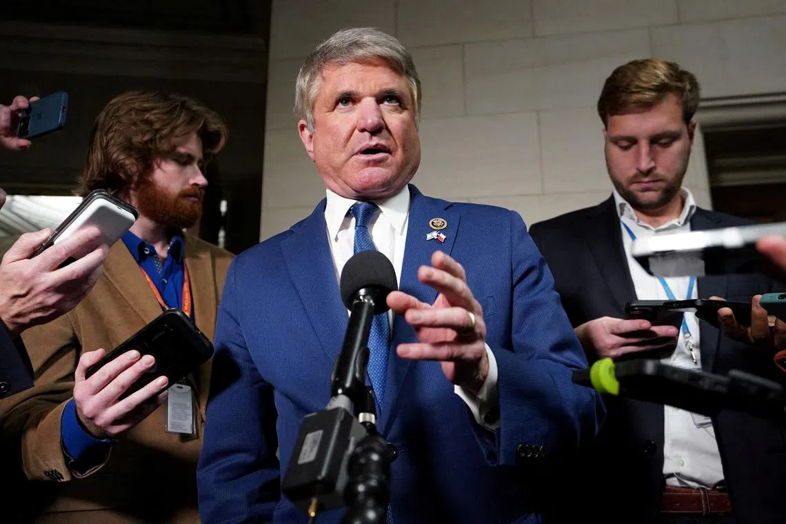 FILE PHOTO: U.S. Representative Michael McCaul (R-TX) speaks to reporters in the Longworth House office building on Capitol Hill in Washington, U.S., October 11, 2023. REUTERS/Kevin Lamarque/File Photo