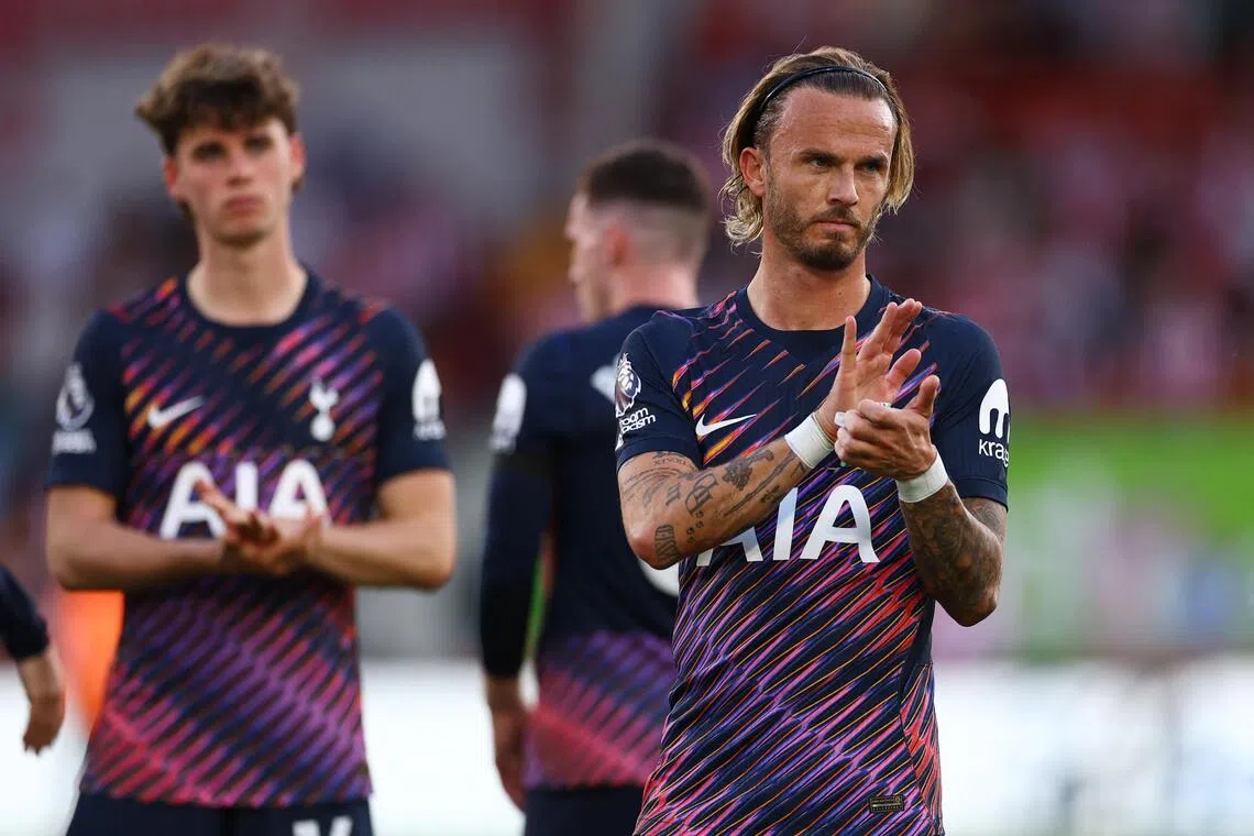 Tottenham’s James Maddison applauding fans after the match.