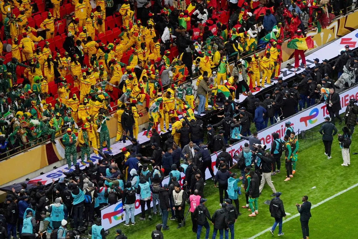 FILE PHOTO: Soccer Football - CAF Africa Cup of Nations - Morocco 2025 - Final - Senegal v Morocco - Prince Moulay Abdellah Stadium, Rabat, Morocco - January 18, 2026 Senegal fans react in the stand after Morocco were awarded a penalty following a VAR review REUTERS/Stringer/File Photo