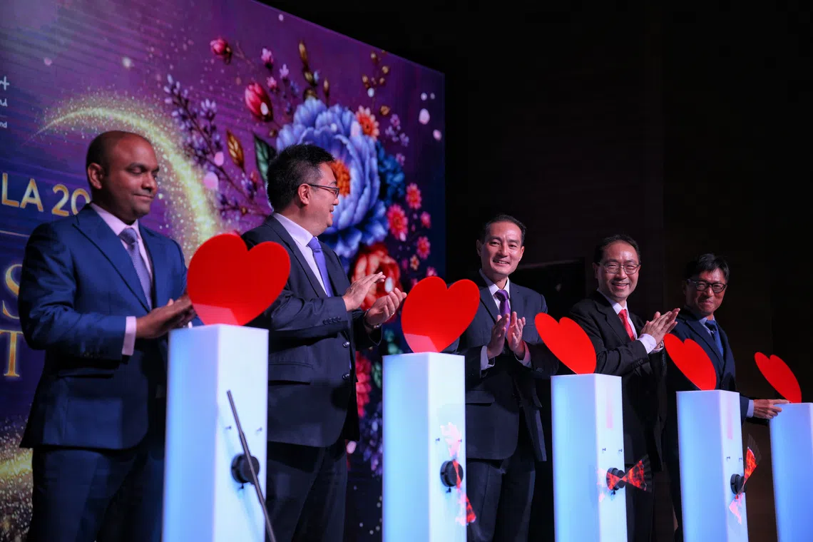 Senior Minister of State for Health Tan Kiat How (third from left) launches CIPHER at the 6th NHCS Heart to Heart Gala on Oct 16. Pictured with him are (left to right) Assistant Professor Chrishan Ramachandra, Deputy Director, CIPHER; Professor Derek Hausenloy, Director, CIPHER; Professor Yeo Khung Keong, CEO, NHCS; and Professor Ronald Li, Founder, Chairman and CEO, Medera Inc..