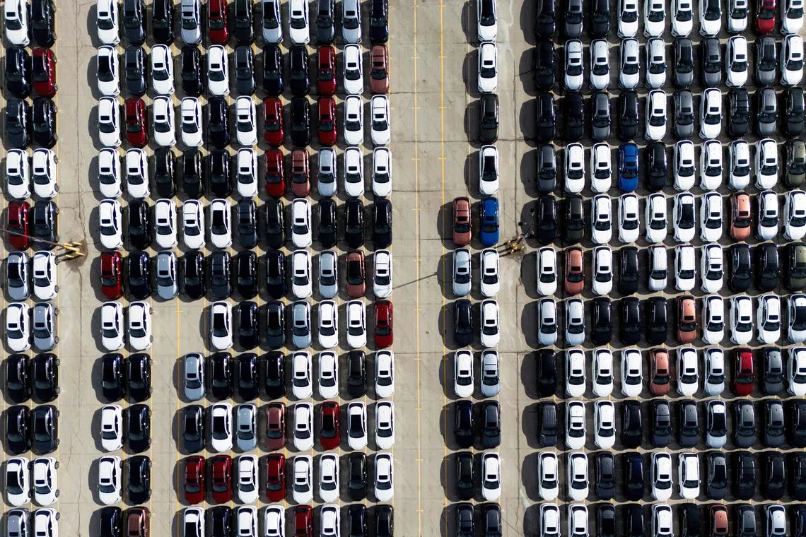 Vehicles are parked in lots at the Toyota Motor Manufacturing plant in Cambridge, Ontario, Canada, on Mar 13, 2025.
