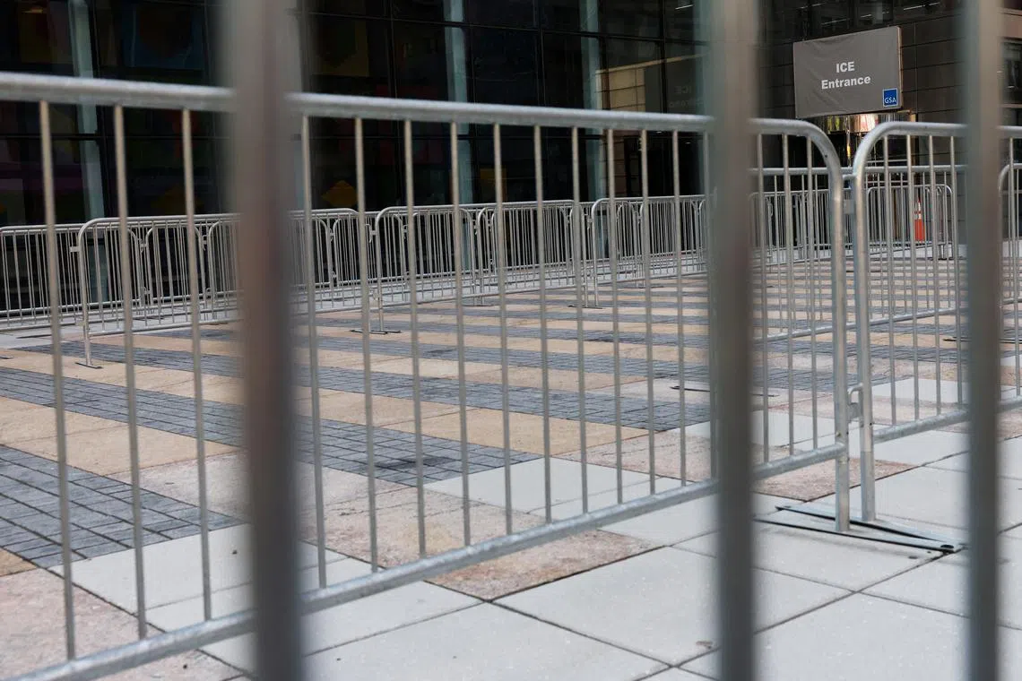 The entrance to the U.S. Immigration and Customs Enforcement (ICE) office stands behind fences outside 26 Federal Plaza in New York City, U.S., July 22, 2025.  REUTERS/Shannon Stapleton