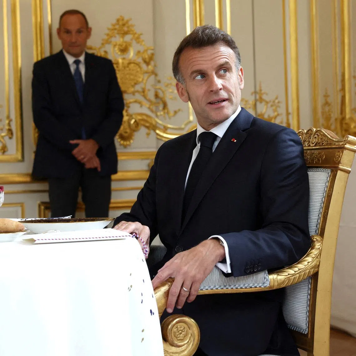 French President Emmanuel Macron poses before a working lunch of bilateral talks with British Prime Minister Keir Starmer ahead of the multinational virtual summit at the Elysee Presidential Palace, in Paris, France, on April 17, 2026. Tom Nicholson/Pool via REUTERS