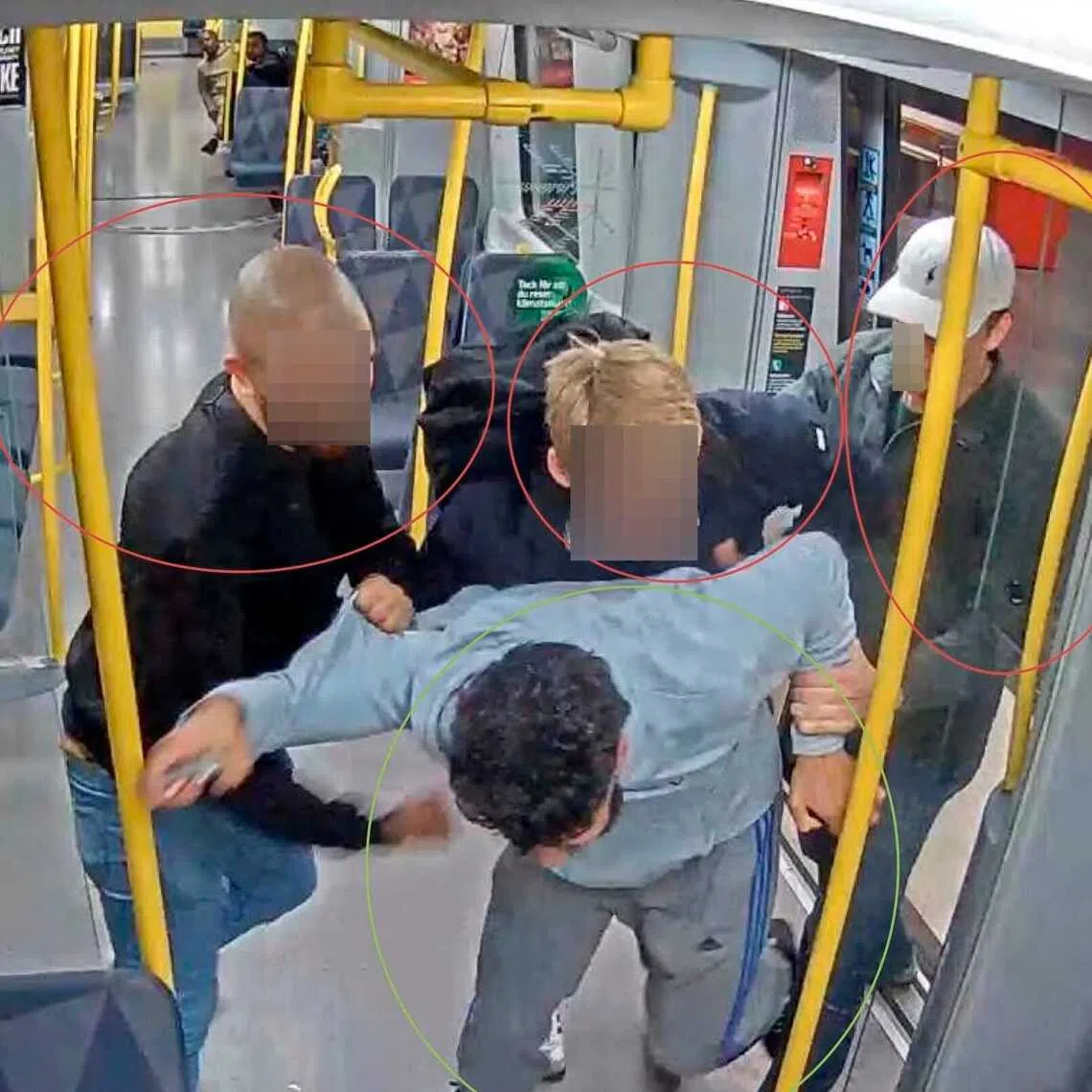 Three of the four men beat a man on a subway train. 