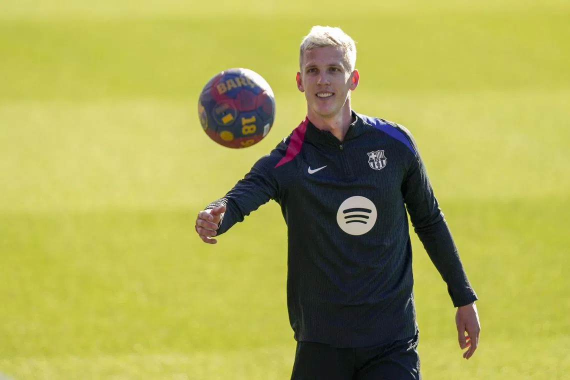 Dani Olmo during a training session with Barcelona, as his future at the club remains uncertain.