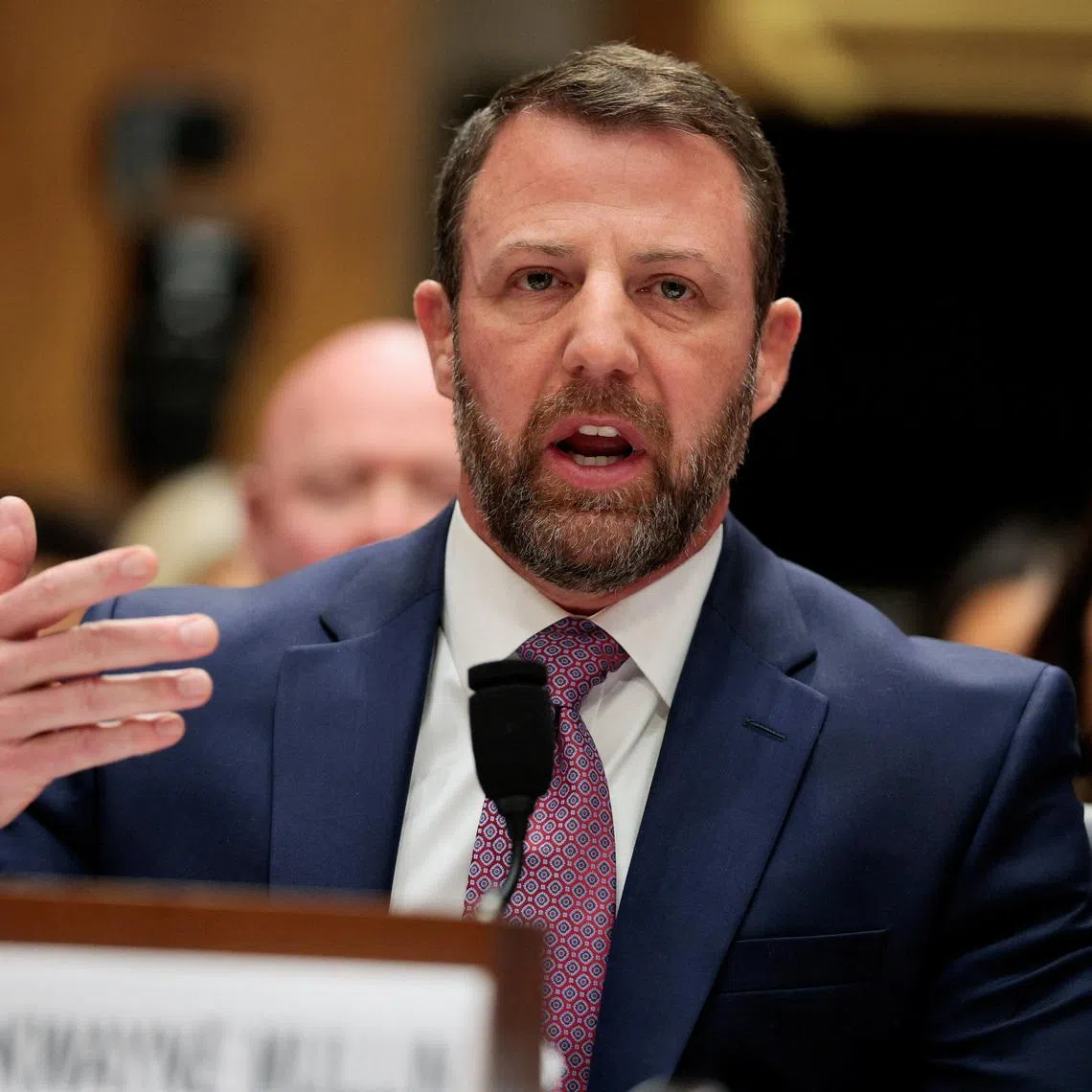 U.S. Senator Markwayne Mullin, President Donald Trump's nominee to be Homeland Security secretary, tesifies before a Senate Homeland Security and Governmental Affairs Committee confirmation hearing on Capitol Hill in Washington, D.C., U.S., March 18, 2026. REUTERS/Evan Vucci
