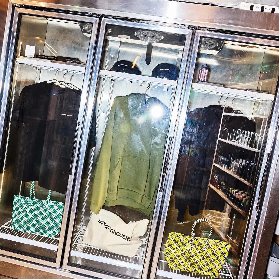 Branded merchandise inside refrigerators in Happier Grocery in New York, Jan. 28, 2026. Happier Grocery is an entry point for people seeking a community built on inside knowledge.