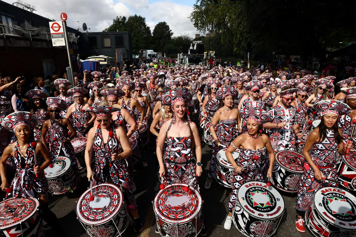 Revellers take part in the Notting Hill Carnival in London, Britain, August 31, 2026. REUTERS/Jack Taylor TPX IMAGES OF THE DAY