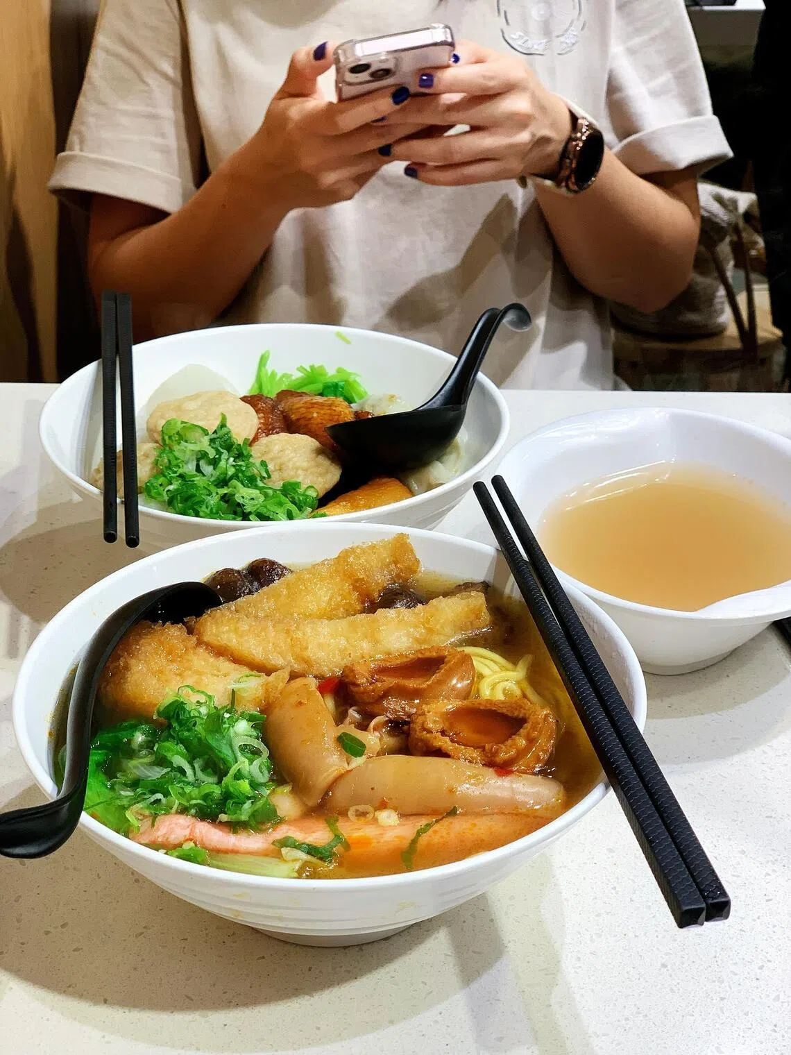 Cart noodles at an eatery in Wan Chai. The soupy noodle dish, typically served with animal innards, was popularised for being a cheap, highly customisable staple sold by street hawkers on roving carts across Hong Kong in the 1950s.