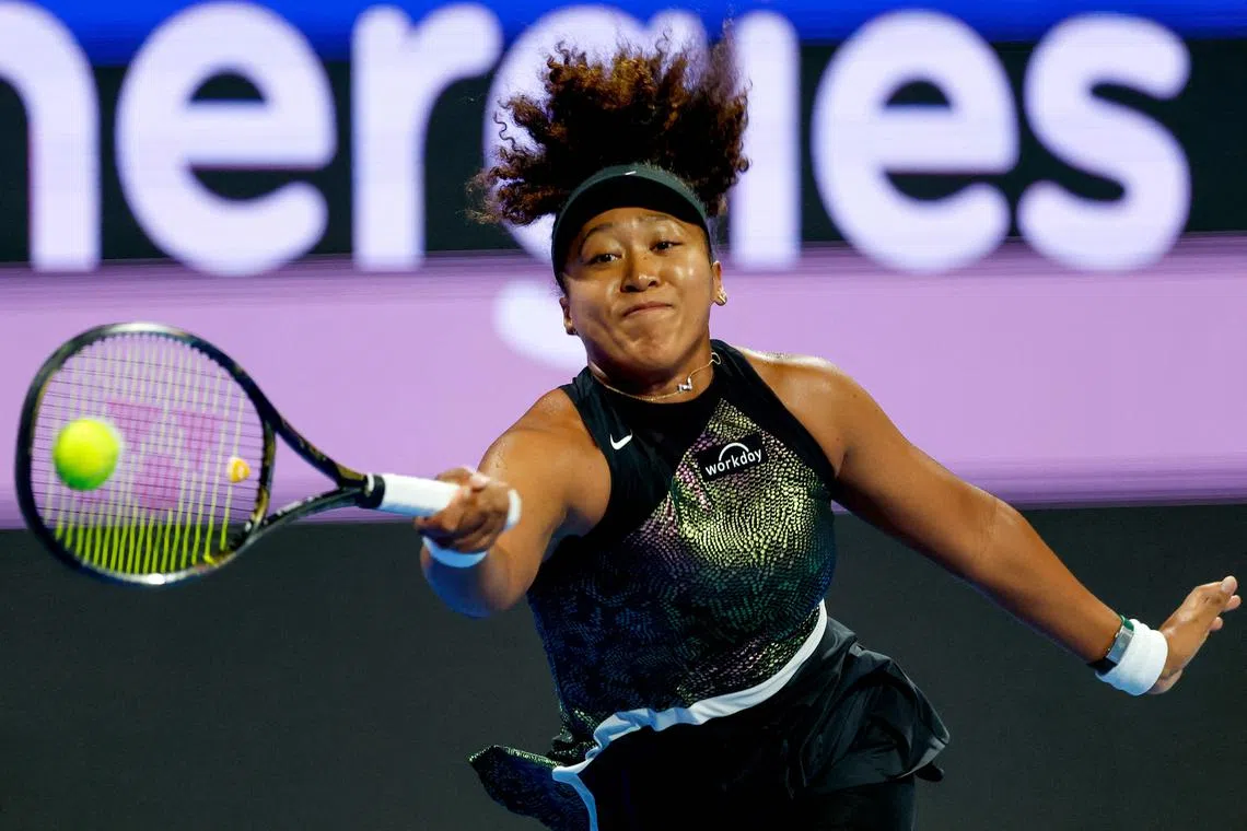 Naomi Osaka hitting a return against  Caroline Garcia during the Qatar WTA Open at Khalifa International Tennis and Squash Complex in Doha.