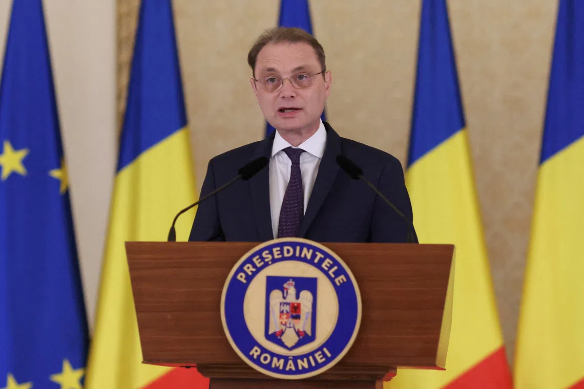 FILE PHOTO: Romania's Prime Minister-designate Luca Niculescu delivers a speech at Cotroceni Palace, in Bucharest, Romania, October 5, 2026. Inquam Photos/George Calin via REUTERS
