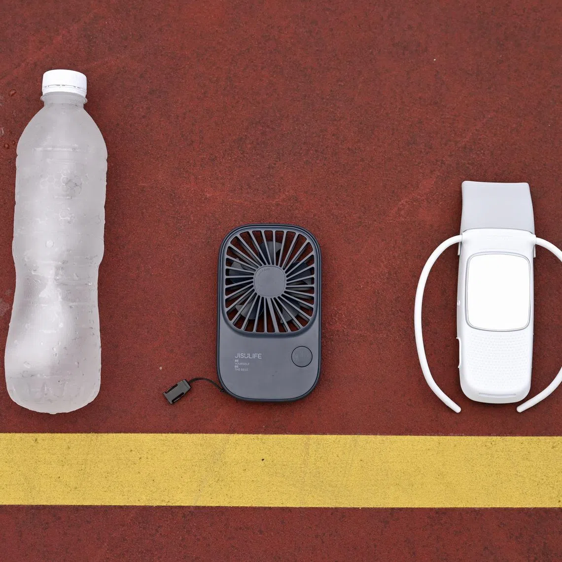 ST puts bottles of ice-cold water, a portable fan and the Sony Reon Pocket to the test by taking each item out for 1km walk in the afternoon sun.