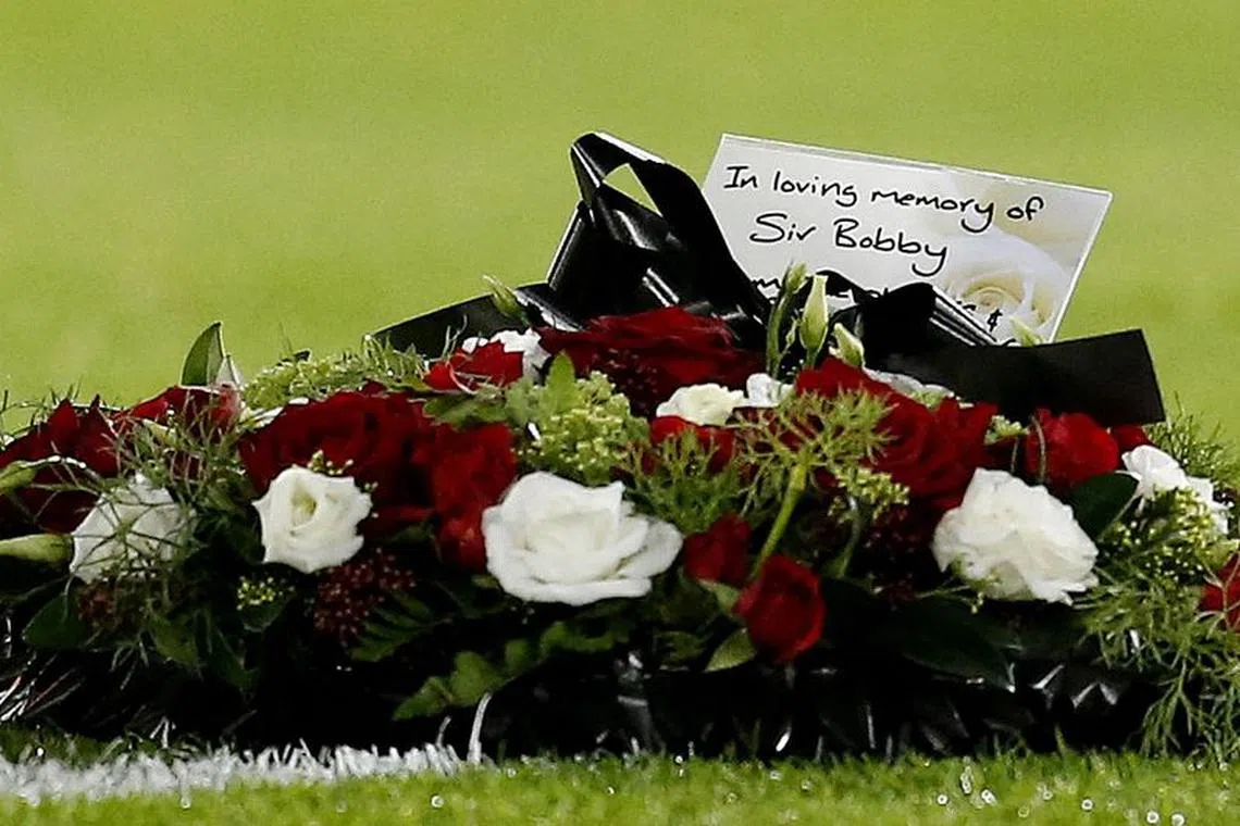 Soccer Football - Premier League - Sheffield United v Manchester United - Bramall Lane, Sheffield, Britain - October 21, 2023 A wreath is laid following the passing of former Manchester United player Bobby Charlton Action Images via Reuters/Ed Sykes