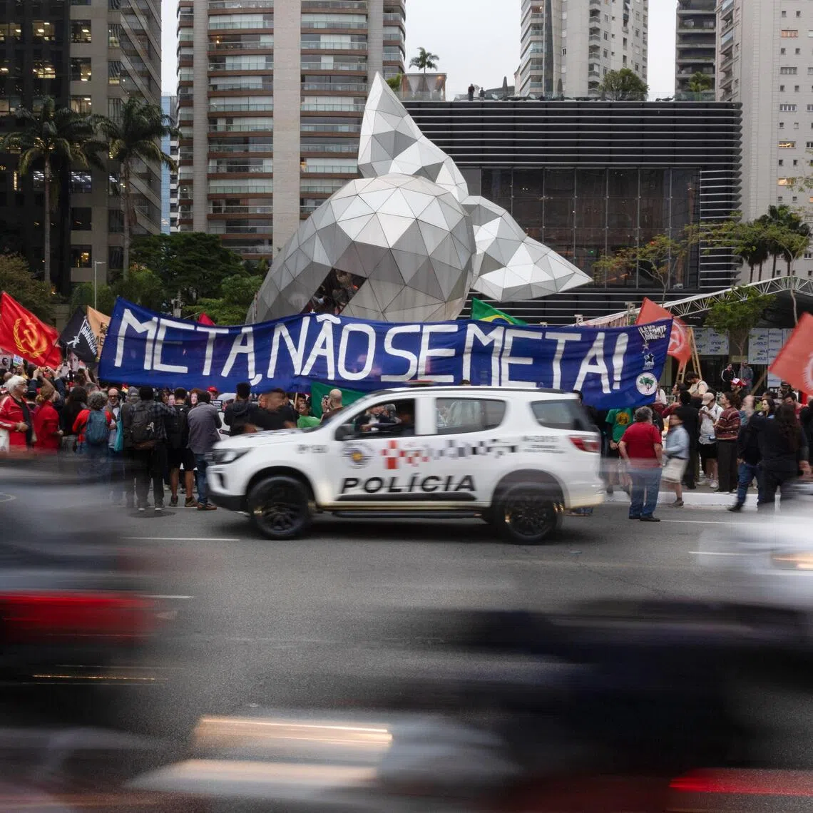 Supporters of Brazilian President Luiz Inacio Lula da Silva protest outside the headquarters of tech giant Meta in Sao Paulo, Brazil, on Oct 19.