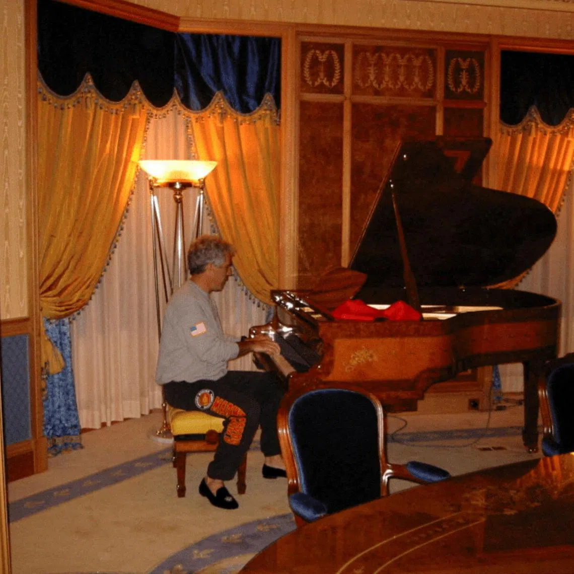 Jeffrey Epstein plays the piano in this image from the estate of late financier and convicted sex offender Jeffrey Epstein, released by the Department of Justice in Washington, D.C., U.S., on December 19, 2025. U.S. Justice Department/Handout via REUTERS