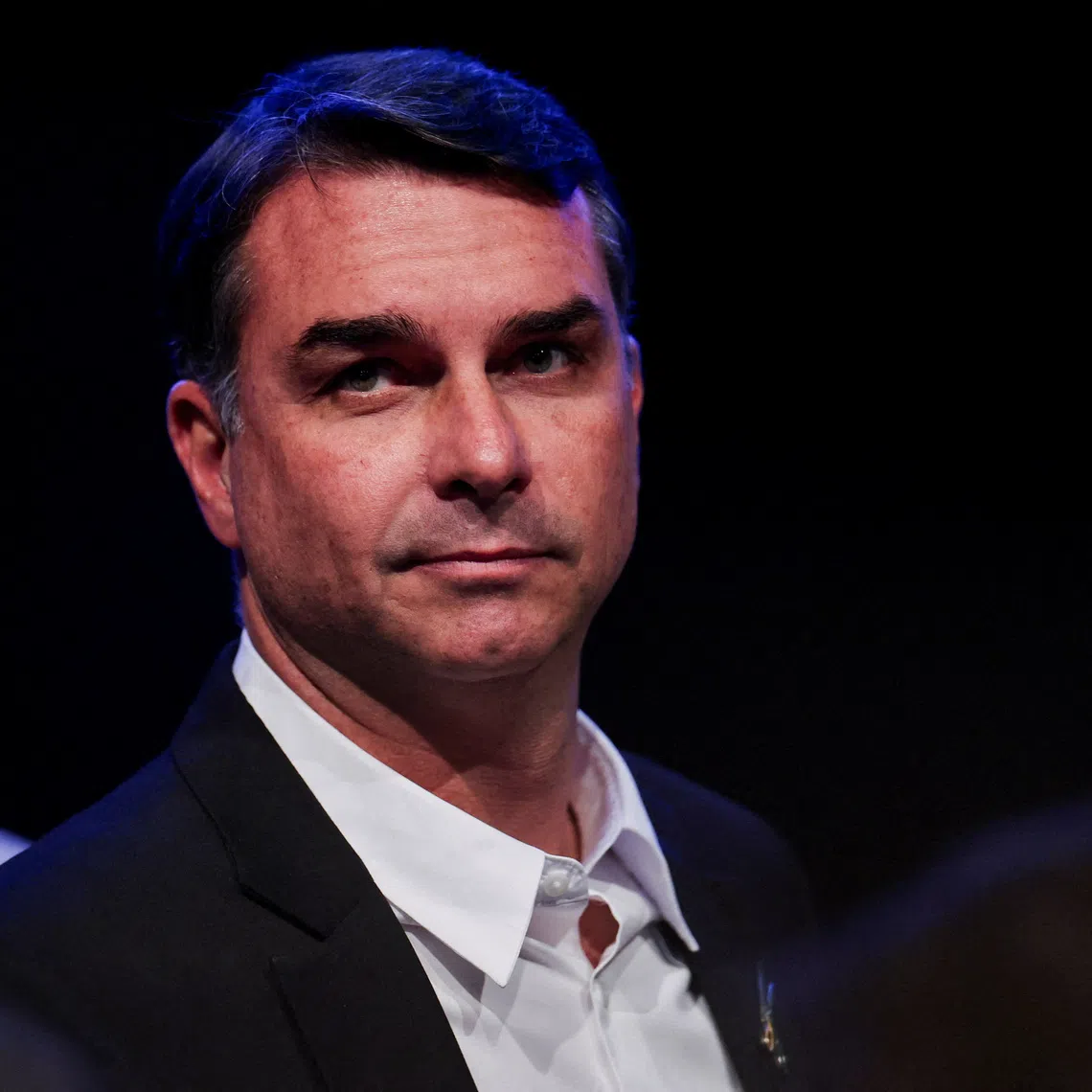FILE PHOTO: Senator Flavio Bolsonaro, the Liberal Party (PL) candidate in Brazil's presidential election, gestures during an event announcing Alfredo Gaspar as Bolsonaro's vice-presidential running mate, in Brasilia, Brazil, August 5, 2026. REUTERS/Adriano Machado/File Photo