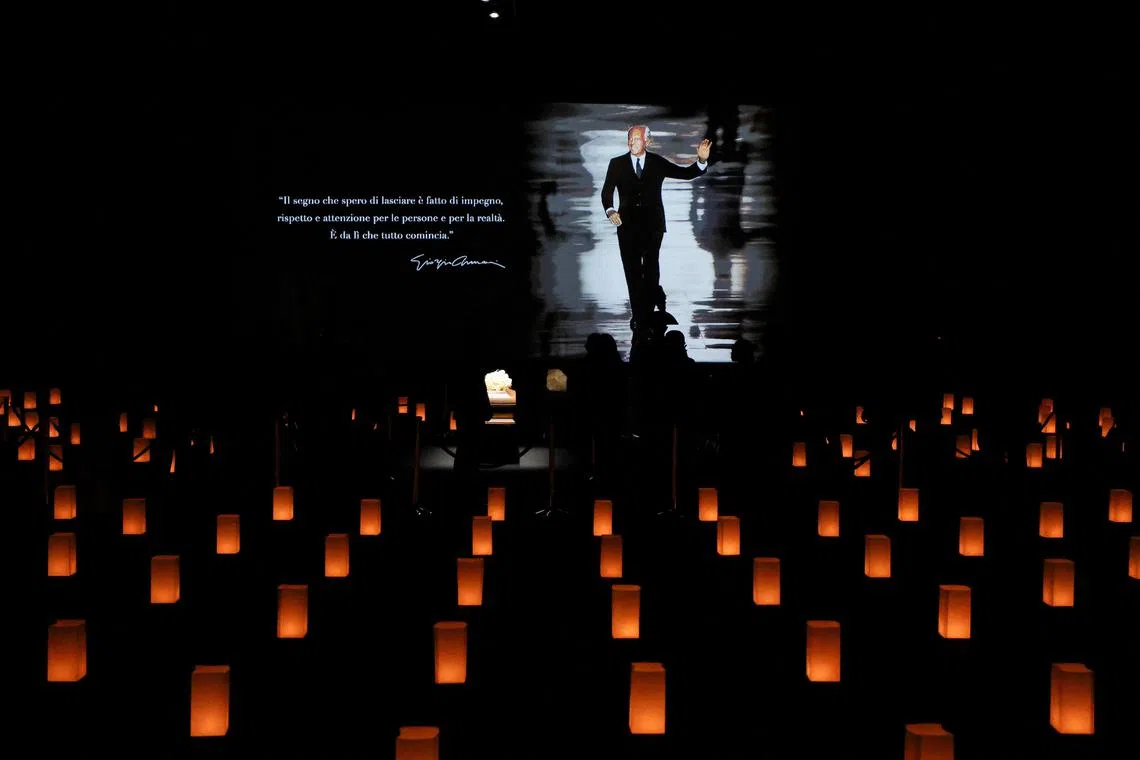People queueing to pay tribute as designer Giorgio Armani lies in state at the Teatro Armani in Milan on Sept 6.
