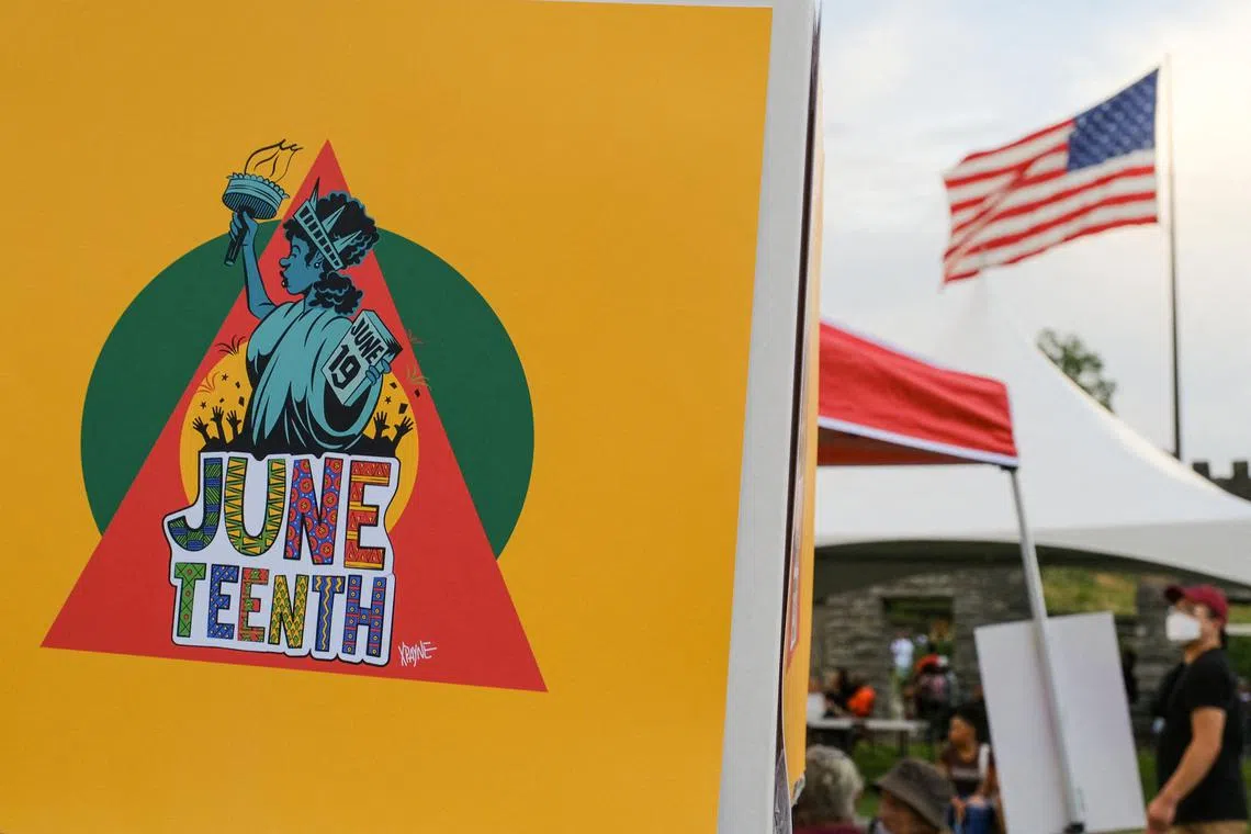 FILE PHOTO: People attend an event to mark Juneteenth, which commemorates the end of slavery in Texas, over two years after the 1863 Emancipation Proclamation freed slaves elsewhere in the U.S., in Nashville, Tennessee, U.S., June 19, 2024. REUTERS/Kevin Wurm/File Photo