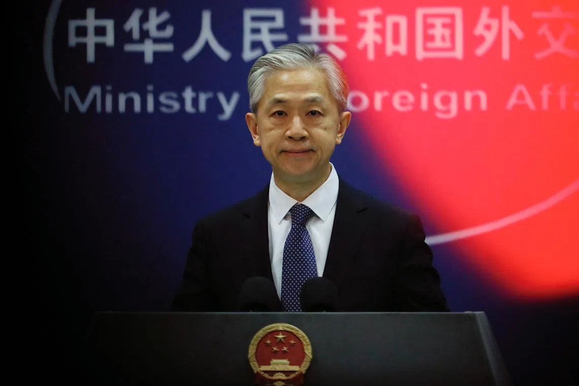 Chinese Foreign Ministry spokesperson Wang Wenbin speaks during a press conference in Beijing, China February 5, 2024. REUTERS/Tingshu Wang/File Photo